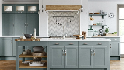 Contemporary painted kitchen cabinets in blue-grey with open shelving and a light worktop.
