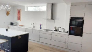 1. Alaska Handless Kitchen in Super Matt Kashmire with Marine Blue island, fitted kitchen in Dublin