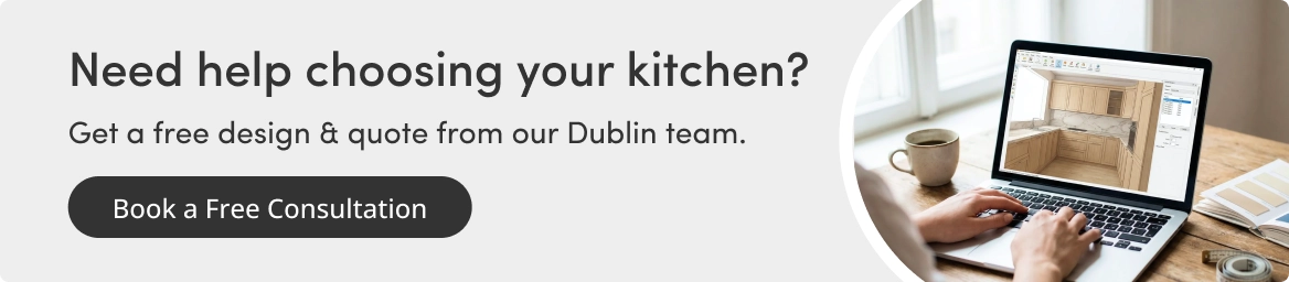 Kitchen designer creating a 3D kitchen plan on a laptop