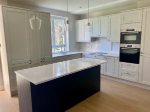 Completed kitchen cabinets project in Dublin with island storage and modern worktops