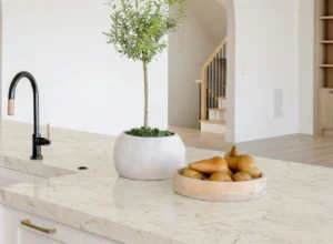 Marble-effect laminate worktop with sink in a bright Irish kitchen. 