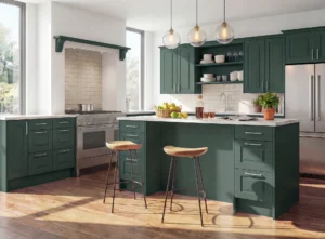 Dark green fitted kitchen with island, open shelving and large windows in a Dublin home