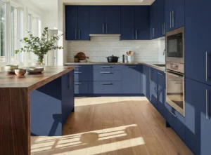 Marine blue slab kitchen doors with wooden worktops, integrated ovens and white subway tile splashback