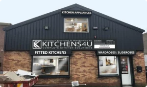 Front exterior of the Kitchens4U showroom in Dublin with large signage across the building