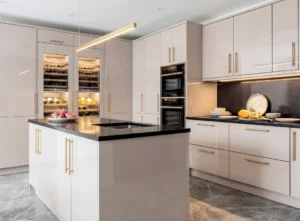 Gloss kitchen with tall and wall cabinets in Ireland
