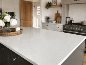White quartz kitchen island worktop with grey veining in an Irish kitchen