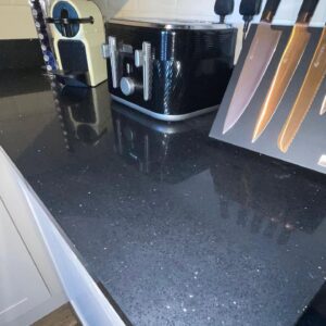 Black Andromeda 38mm laminate worktop detail in a Raheny, Dublin kitchen