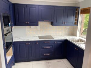 Indigo blue L-shaped Shaker fitted kitchen renovation in Clontarf, Dublin