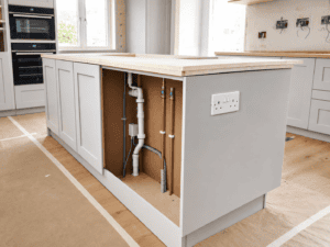 Kitchen island electrics and plumbing installation in a Dublin home