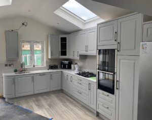 Light grey L-shaped Shaker fitted kitchen renovation in Glasnevin, Dublin
