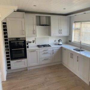 White grey L-shaped Shaker fitted kitchen renovation in Raheny, Dublin