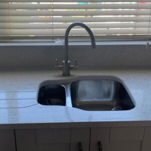 Sicilia Diane undermount sink beneath the window in a Raheny kitchen