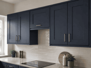 Navy Shaker wall presses with brass handles in a modern Irish kitchen